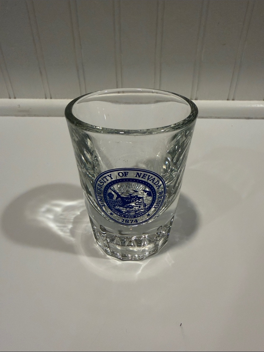 University of Nevada Reno Clear Glass Shot Glass with Blue Logo